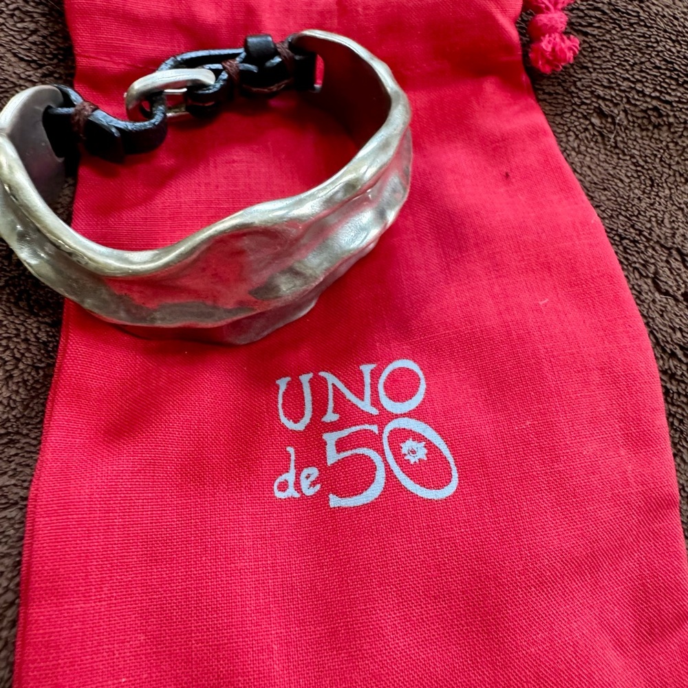 UNO de 50 Metallic Cuff Bracelet with Black Accents brown leather closure